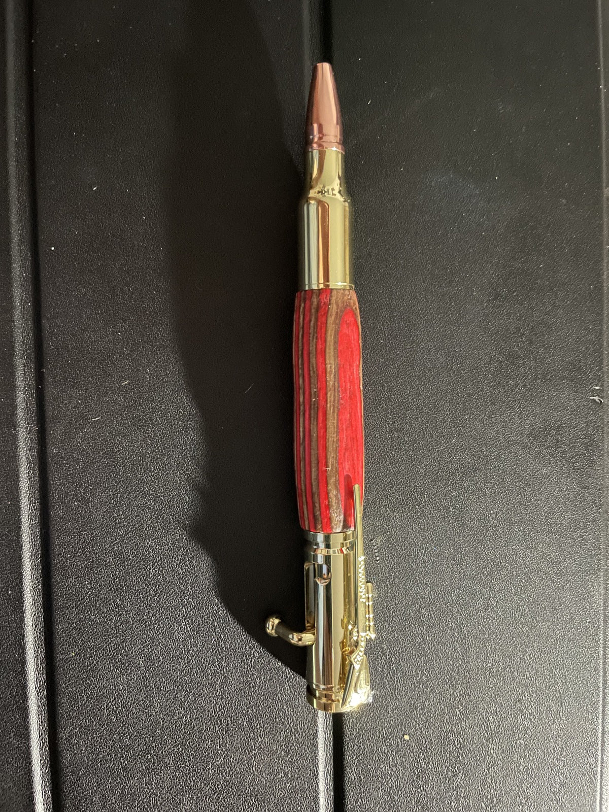 red wood bolt action rifle Pen