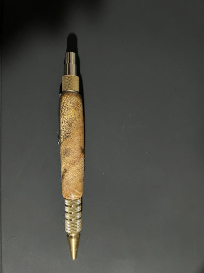 Handcrafted mango wood click pen with natural grain