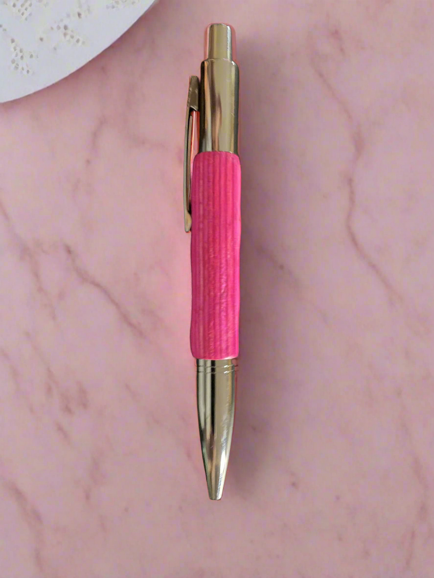 Handcrafted pink wooden click pen with polished finish